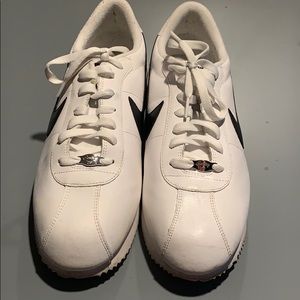 Nike Cortez white with black swosh.